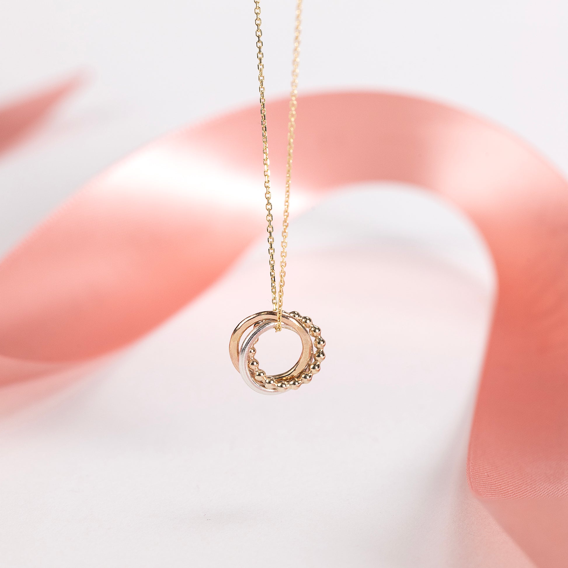 3 Cousins Necklace - 9kt Gold, Rose Gold & Silver Love Knot Necklace