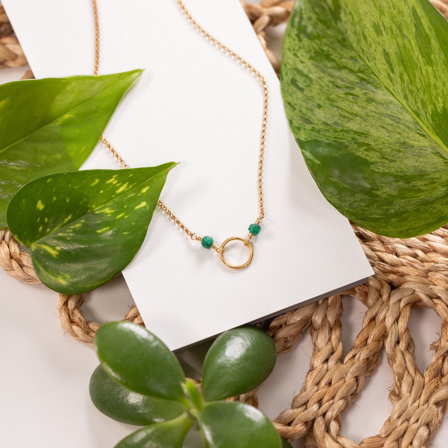emerald halo necklace