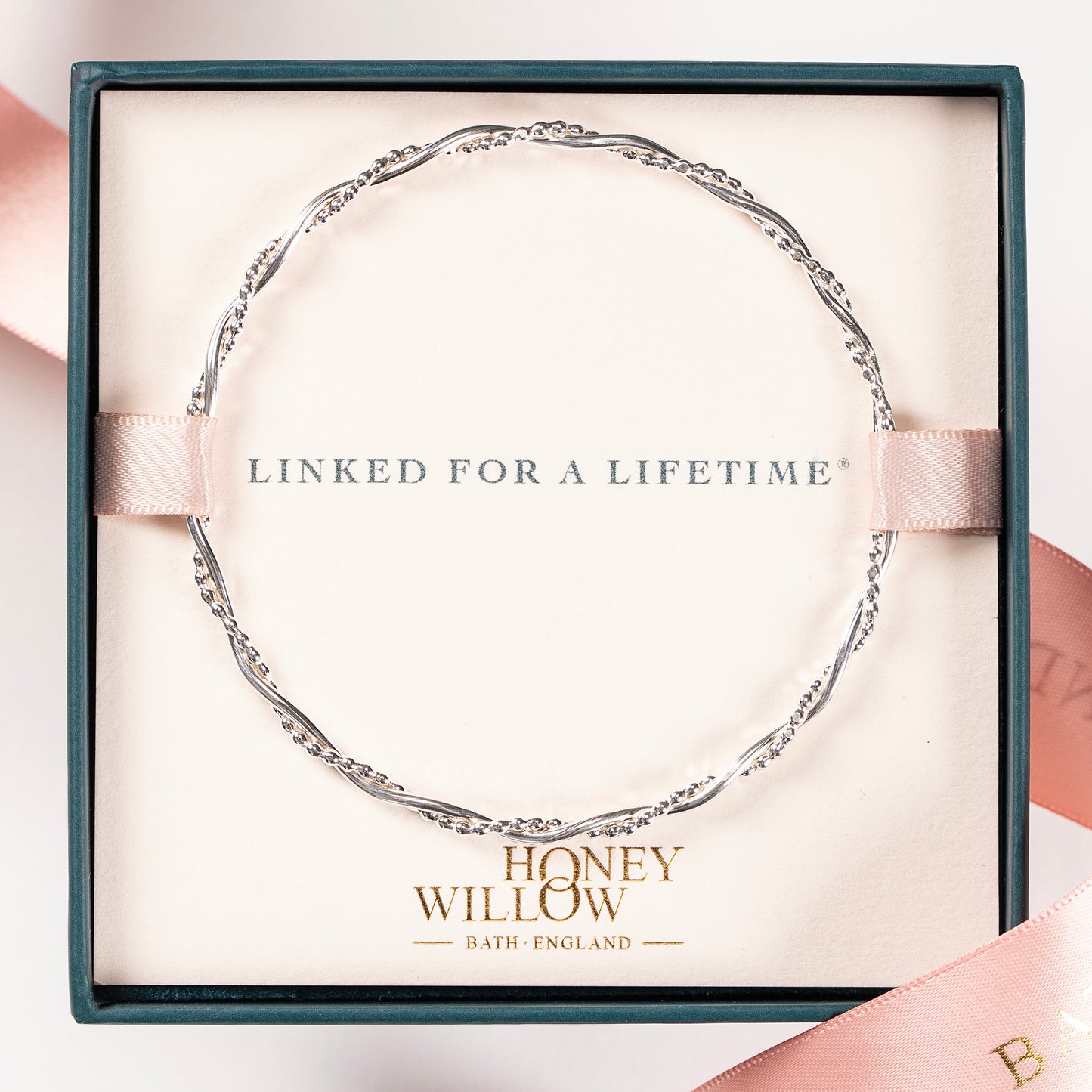 entwined bangle linked for a lifetime
