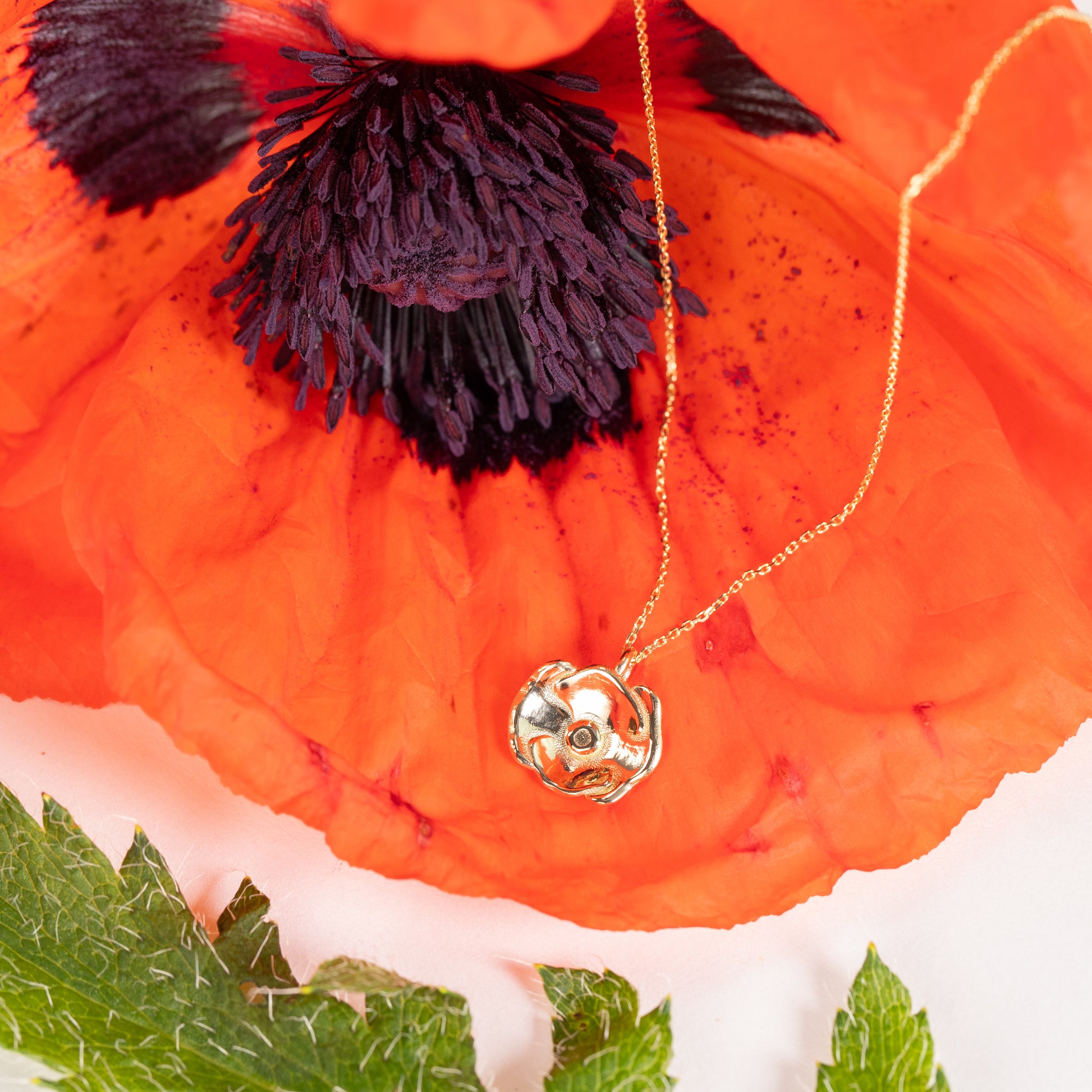 gold poppy necklace