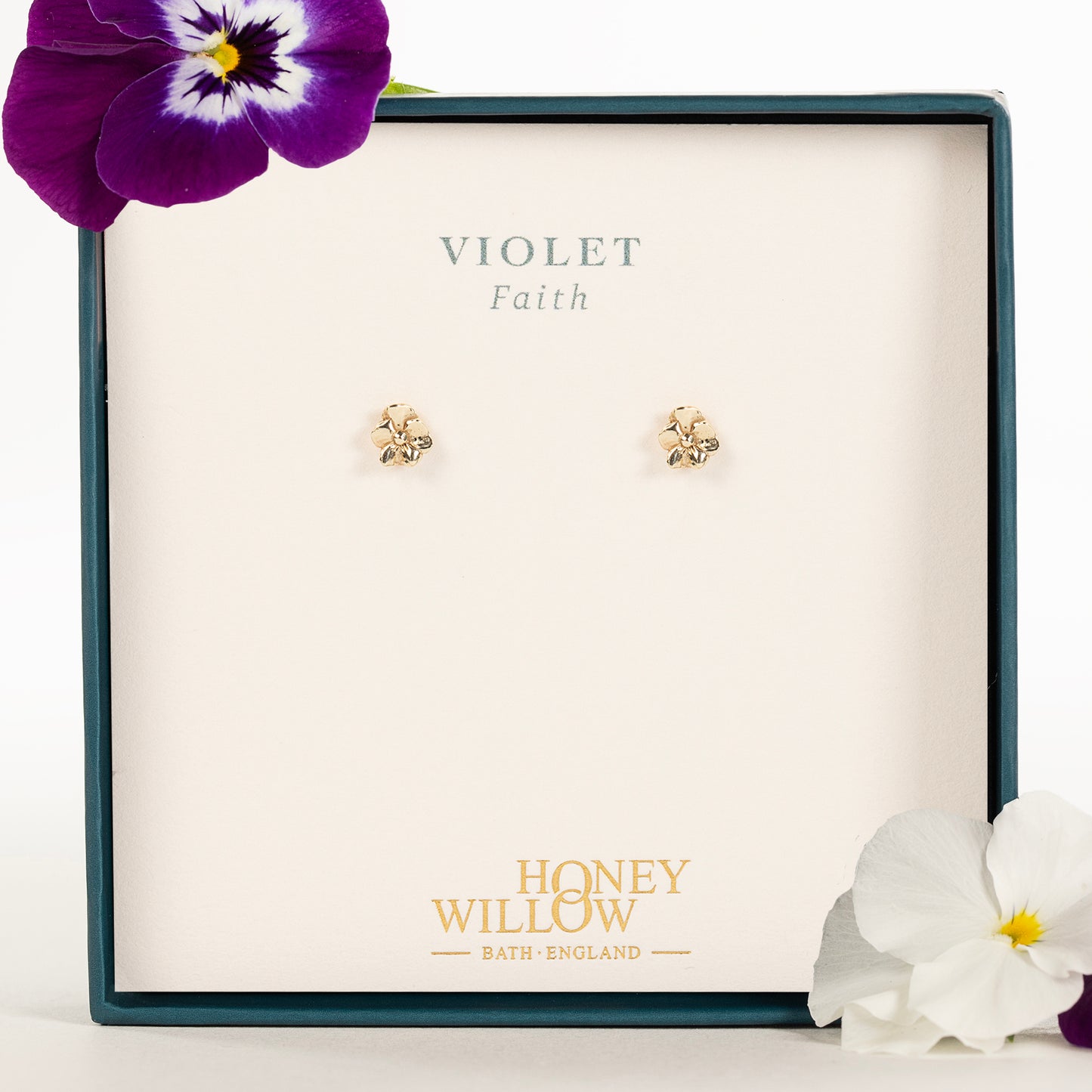 gold violet studs