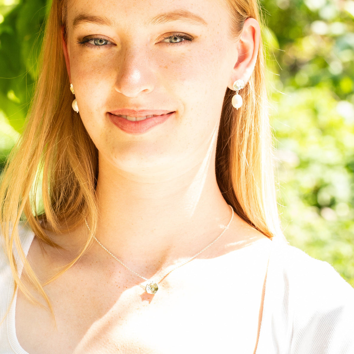 silver poppy necklace