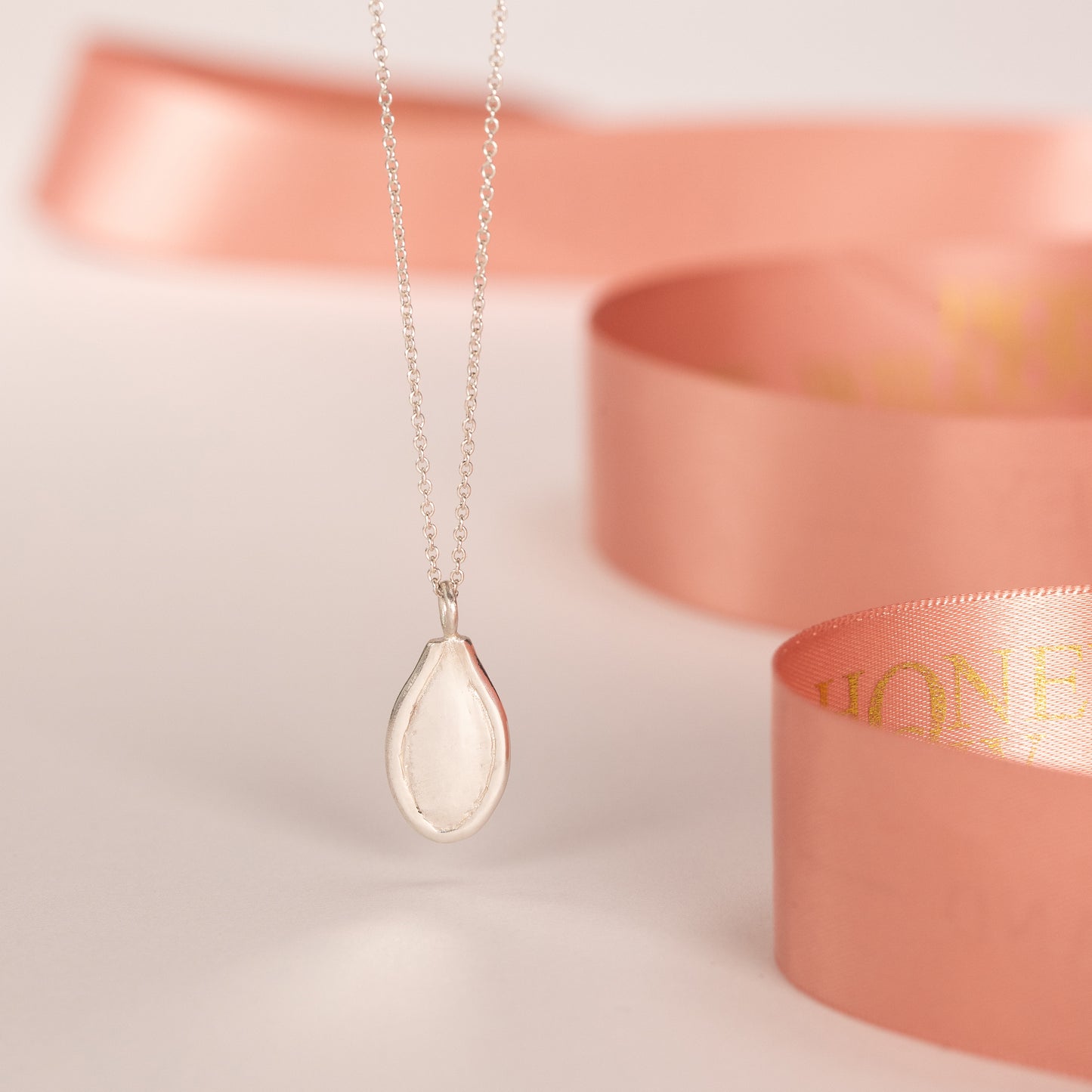 silver seed necklace