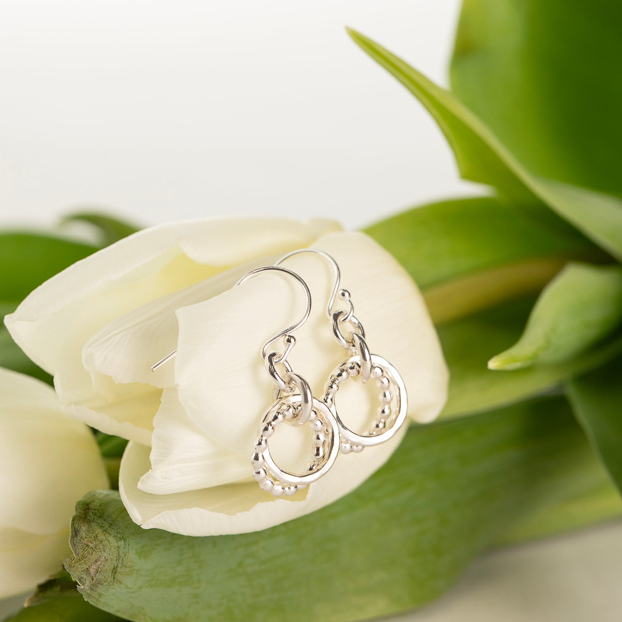 Silver love knot deals earrings