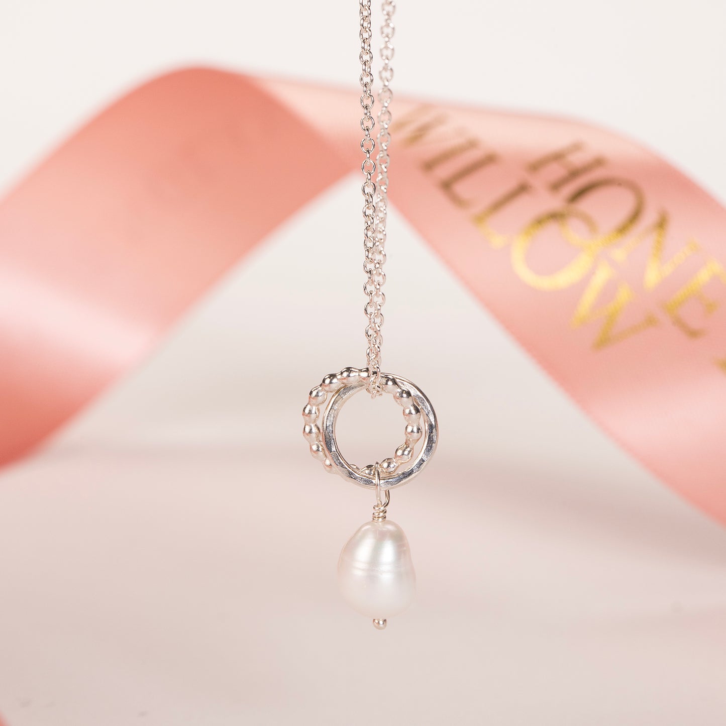 silver love knot pearl necklace