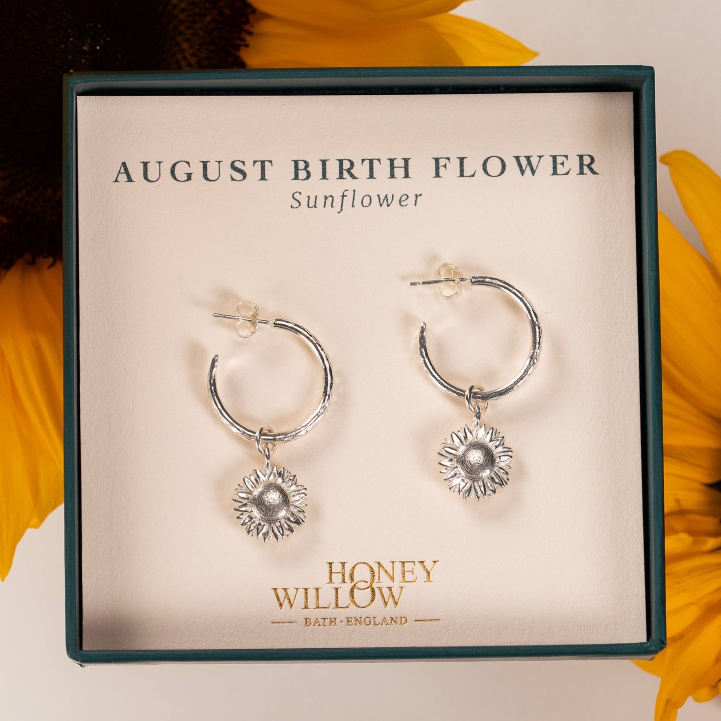 august birth flower earrings