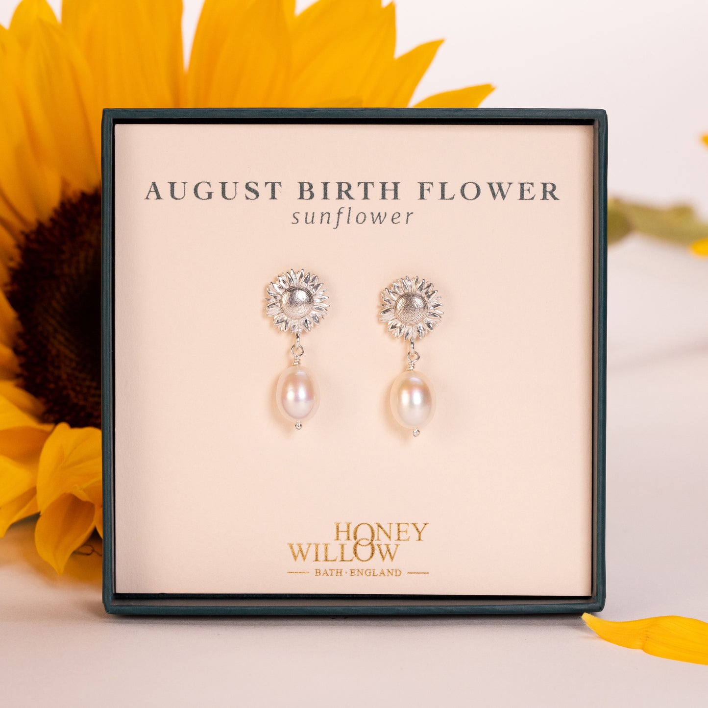 august birth flower earrings