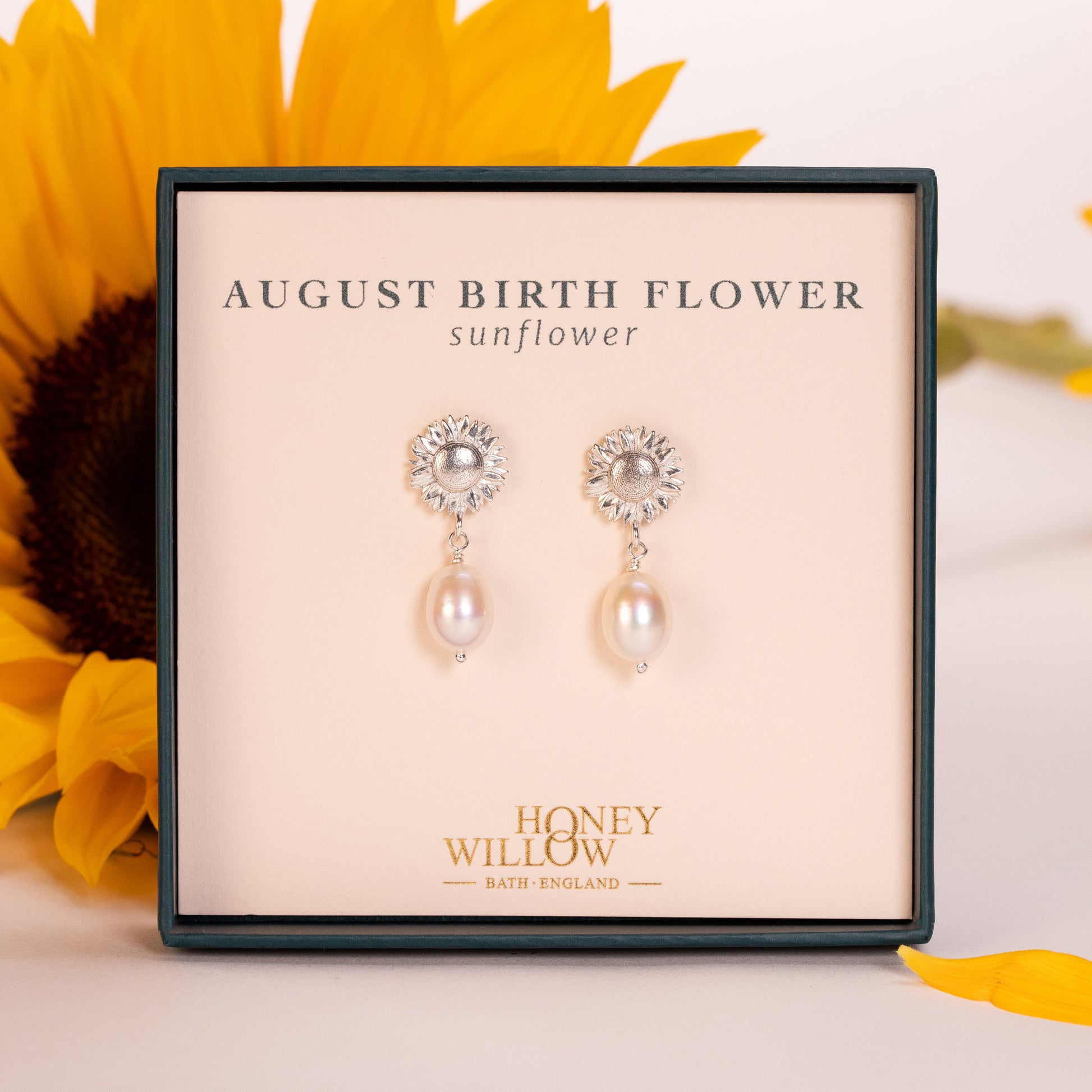 august birth flower earrings