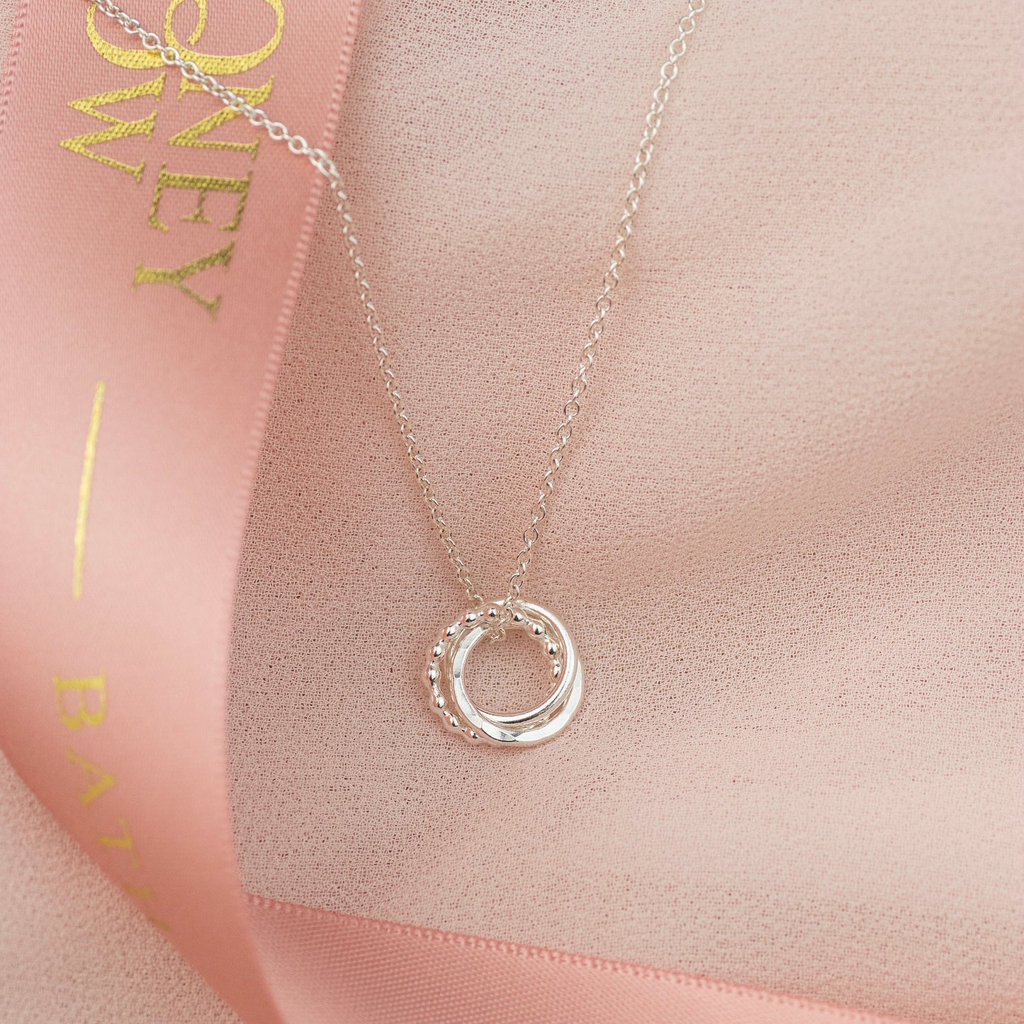 Silver Love Knot Necklaces