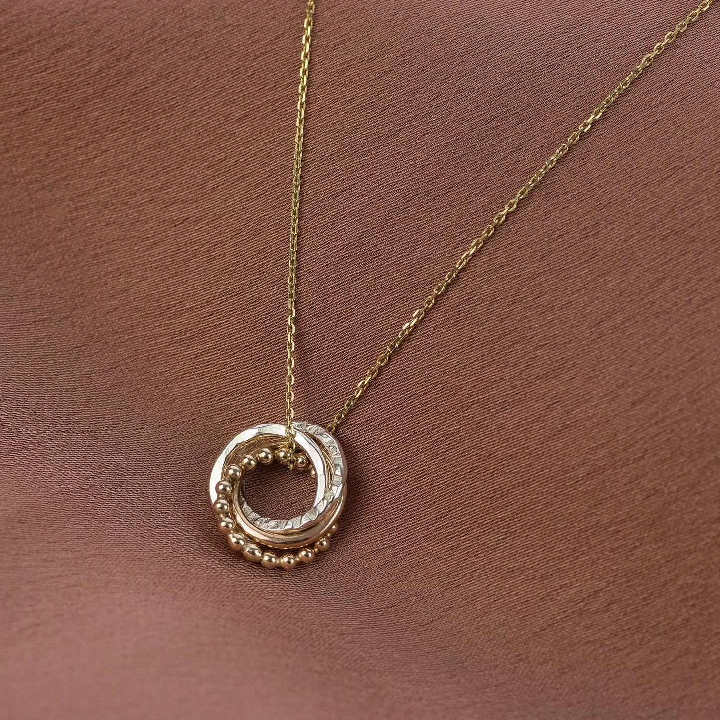4 Siblings Necklace - 9kt Gold, Rose Gold & Silver Love Knot