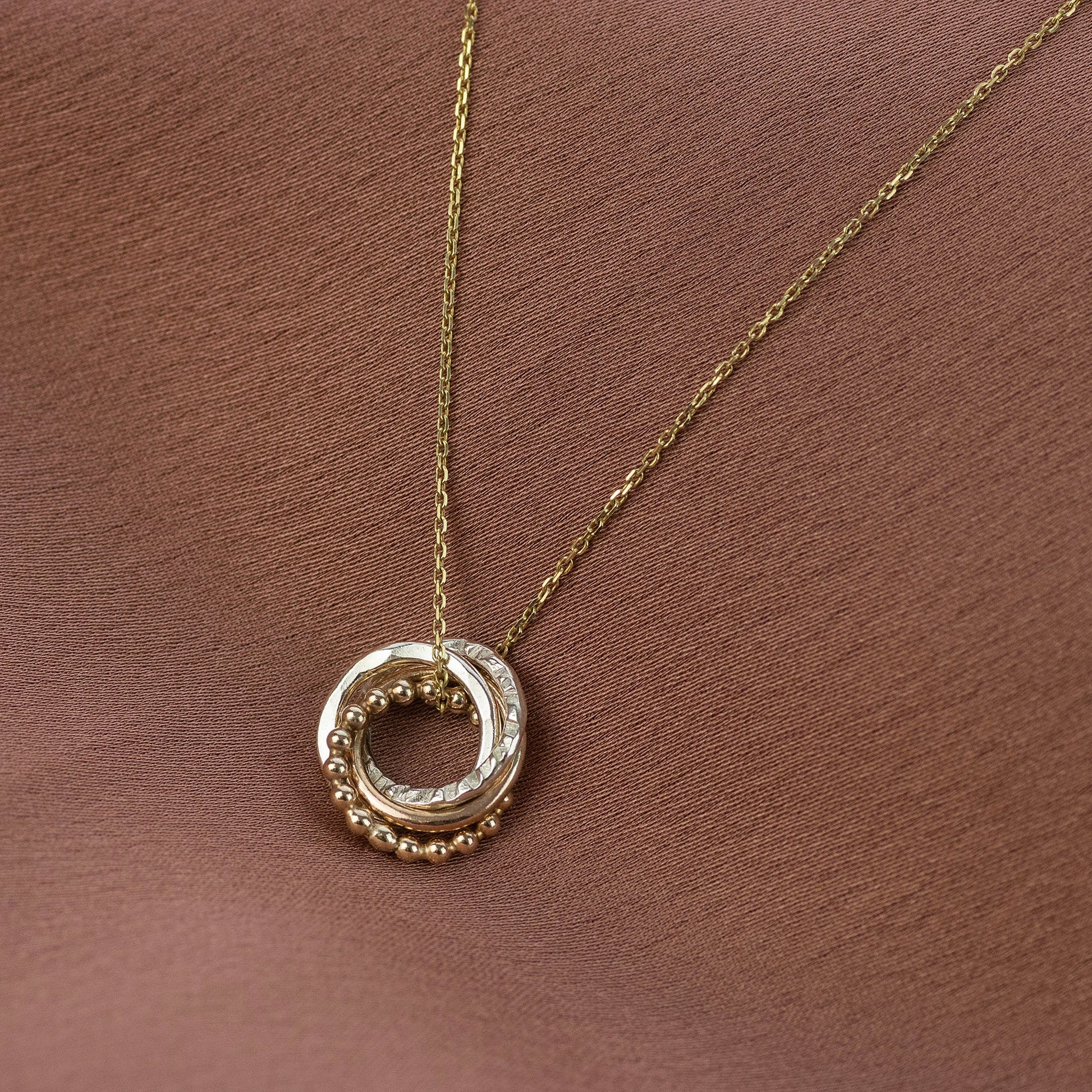 4 Siblings Necklace - 9kt Gold, Rose Gold & Silver Love Knot