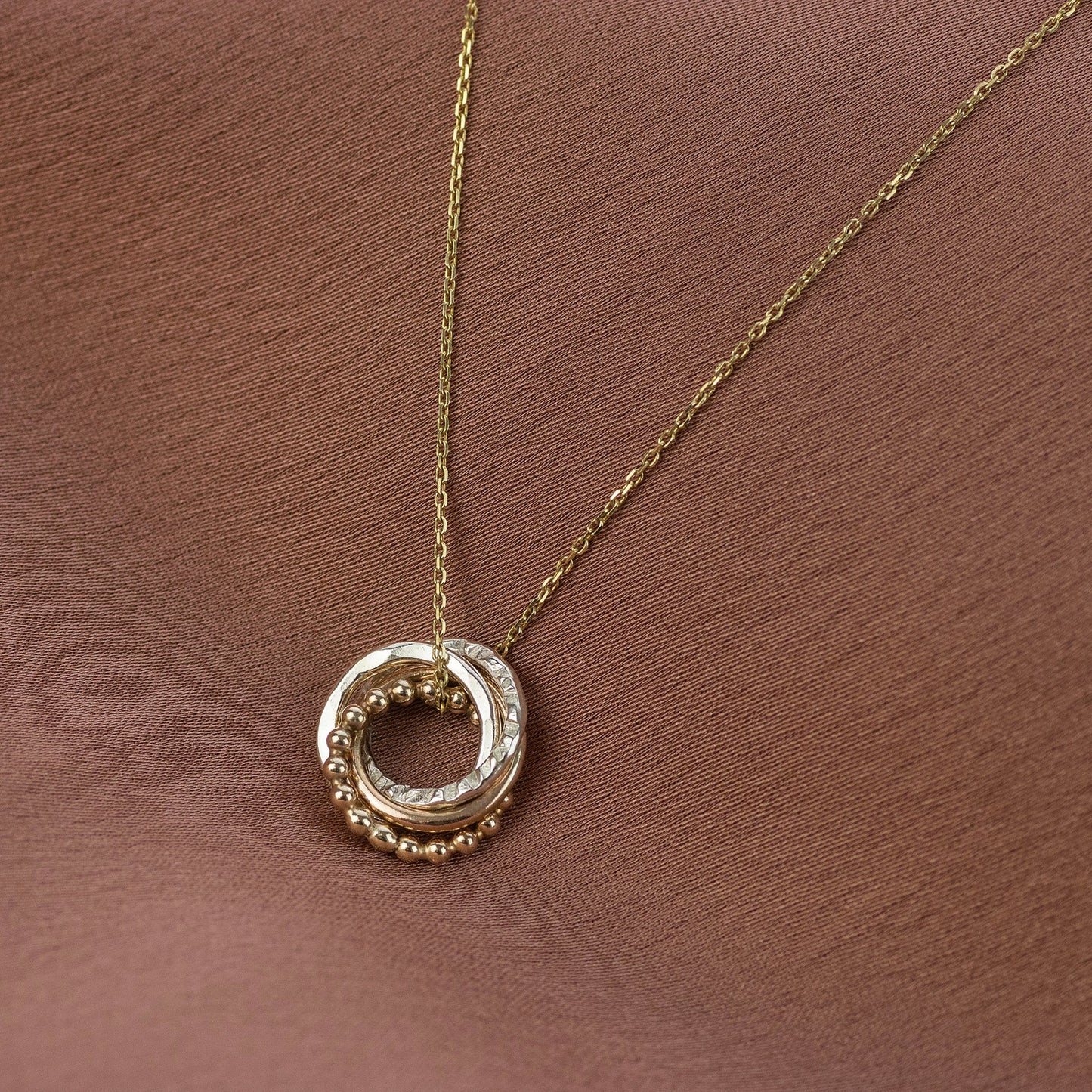 4 Cousins Necklace - 9kt Gold, Rose Gold & Silver Love Knot