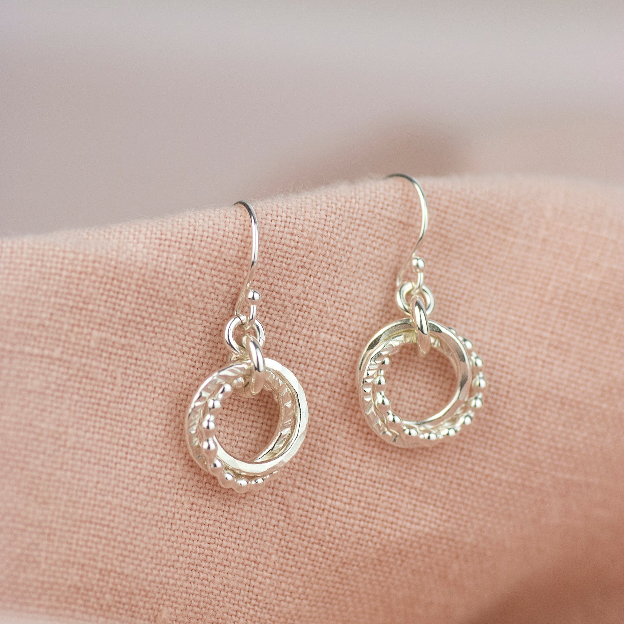 Silver friendship hot sale knot earrings