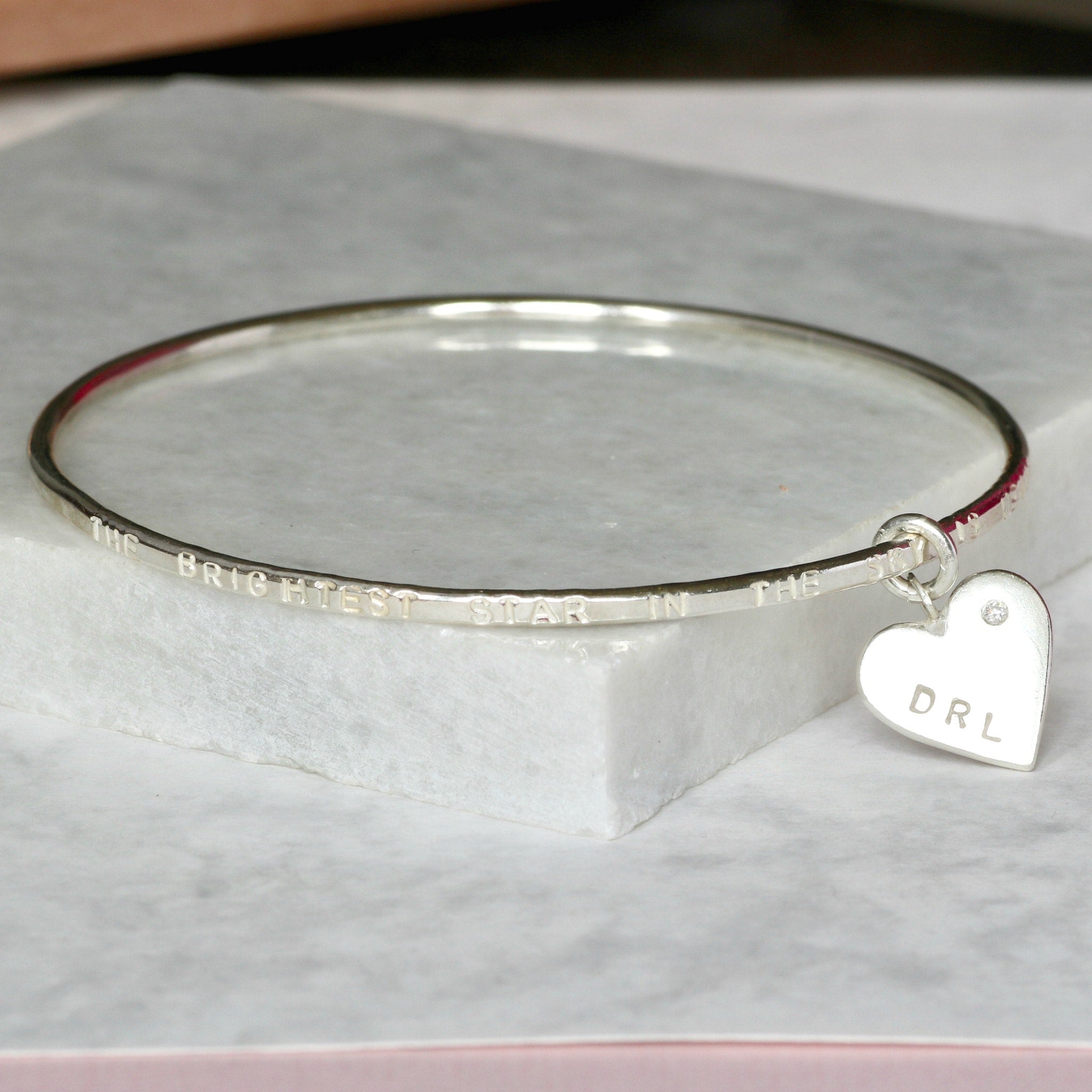 Silver bangle deals with heart charm