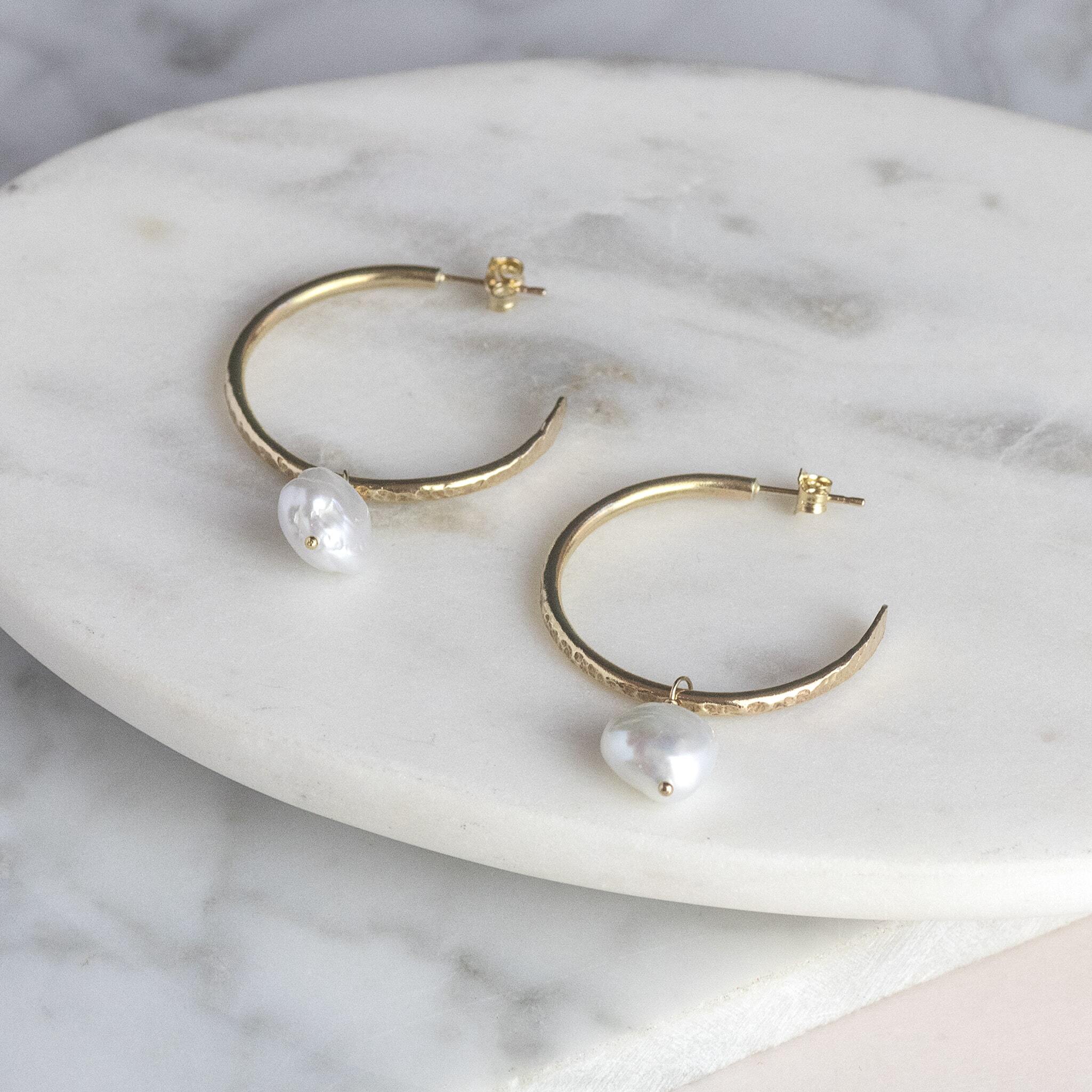 Small gold store pearl earrings